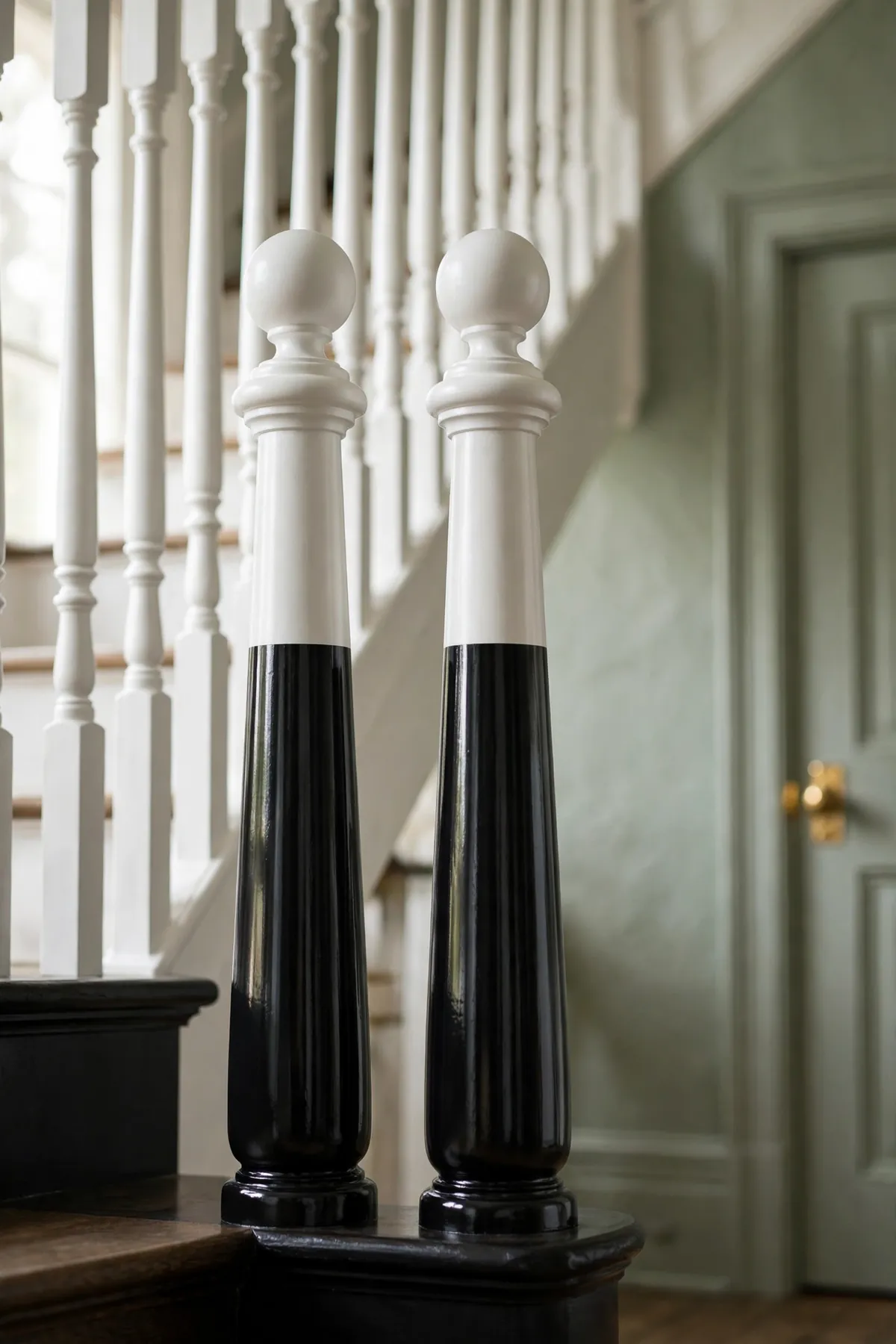 25 Black and White Staircase Ideas That Always Look Expensive black and white staircase ideas: Two-Tone Newel Posts in Black and White