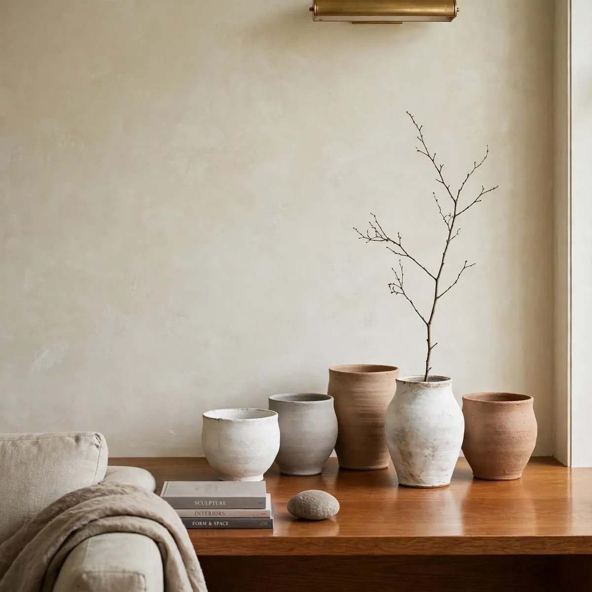 25 Japandi Living Room Ideas for a Calm, Warm, Minimal Home japandi living room ideas: Style a Wabi-Sabi Vignette of Handmade Ceramics